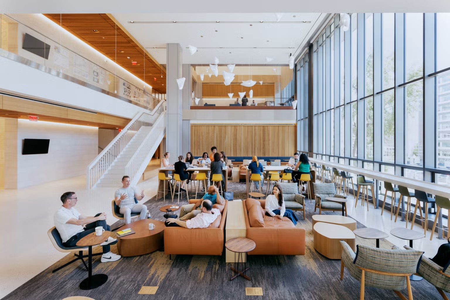 People sitting in the lobby of the 125 E building