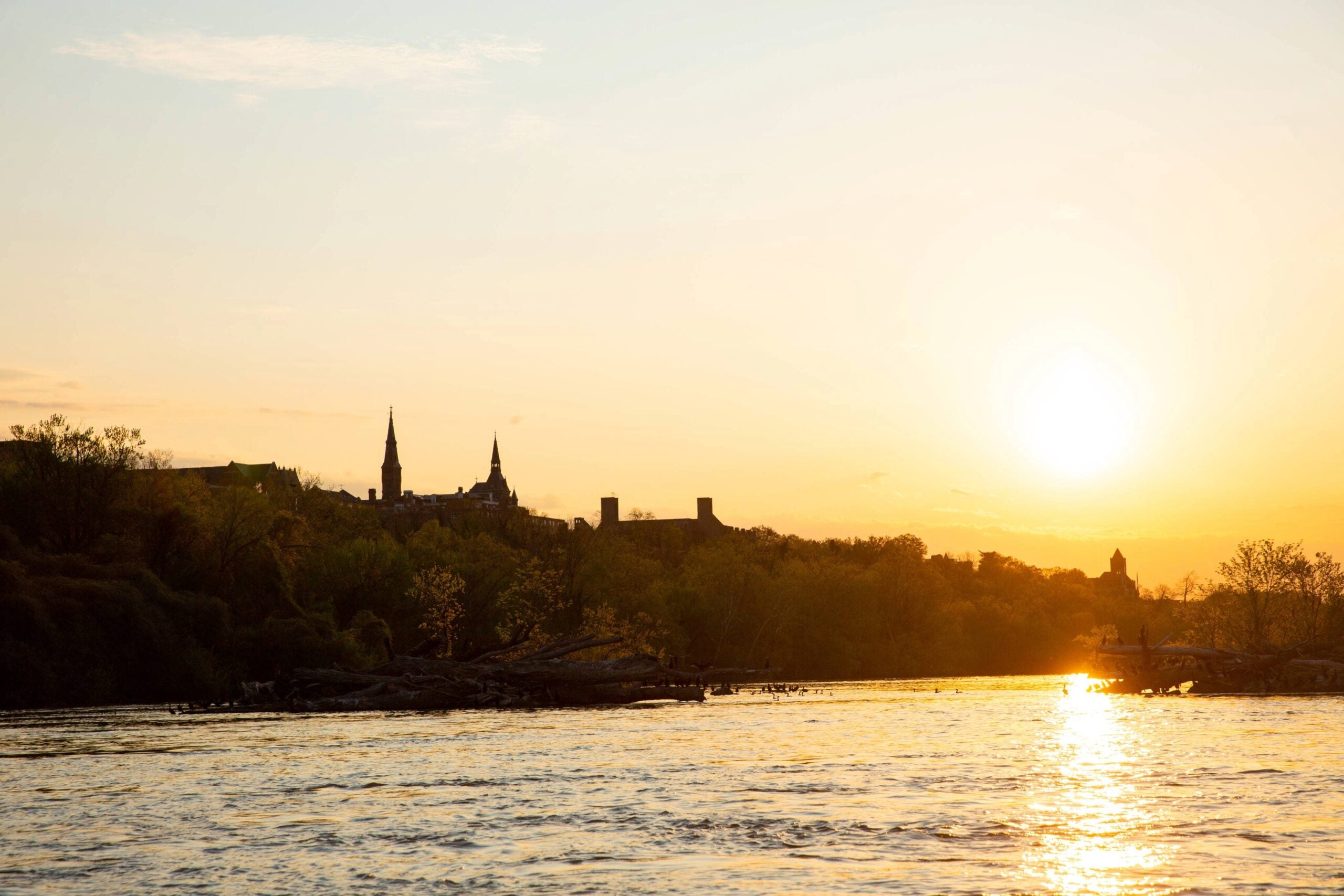 Sunset photo of the Potomac River with Georgetown University in the Skyline