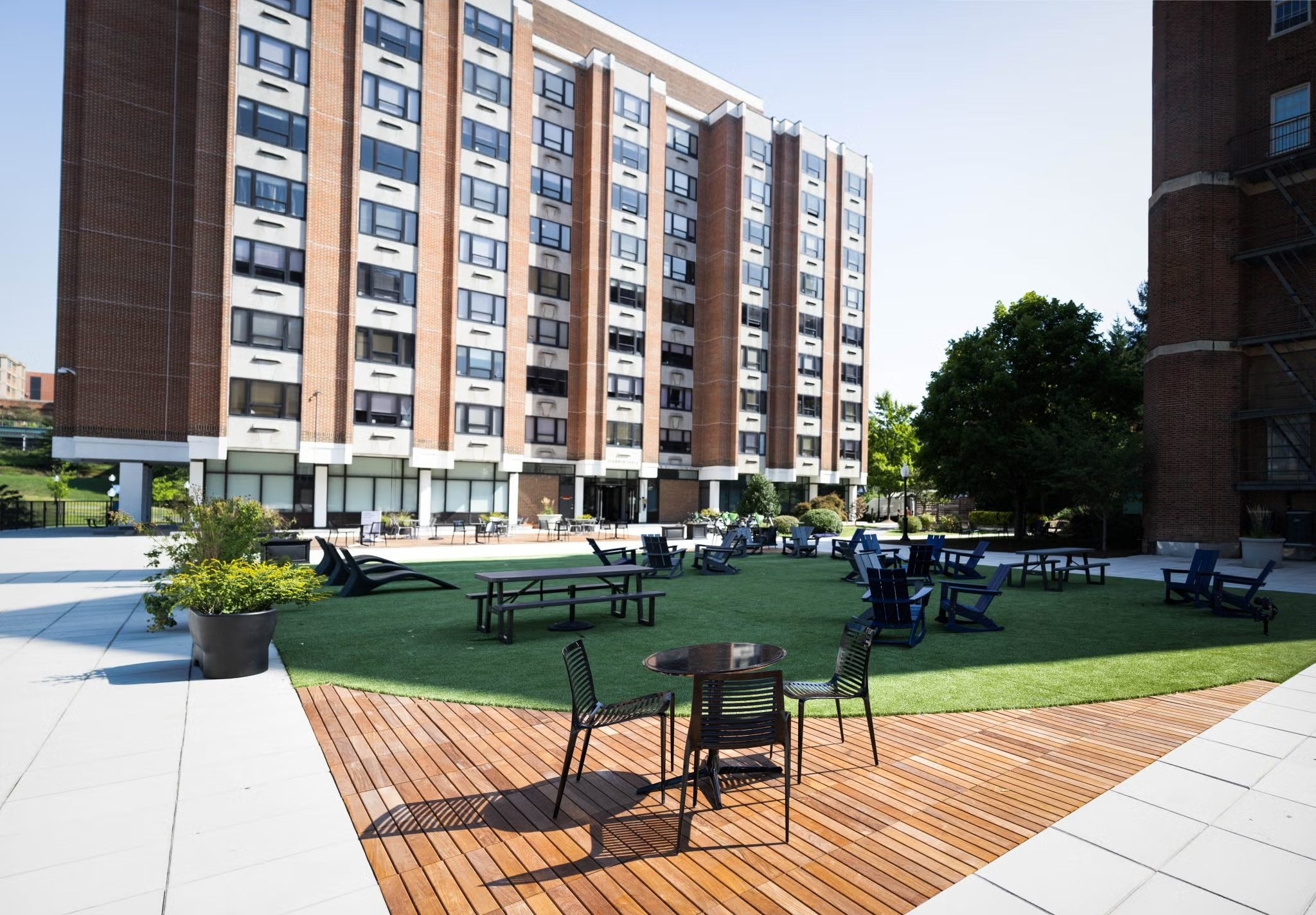 exterior harbin hall patio with tables and chairs